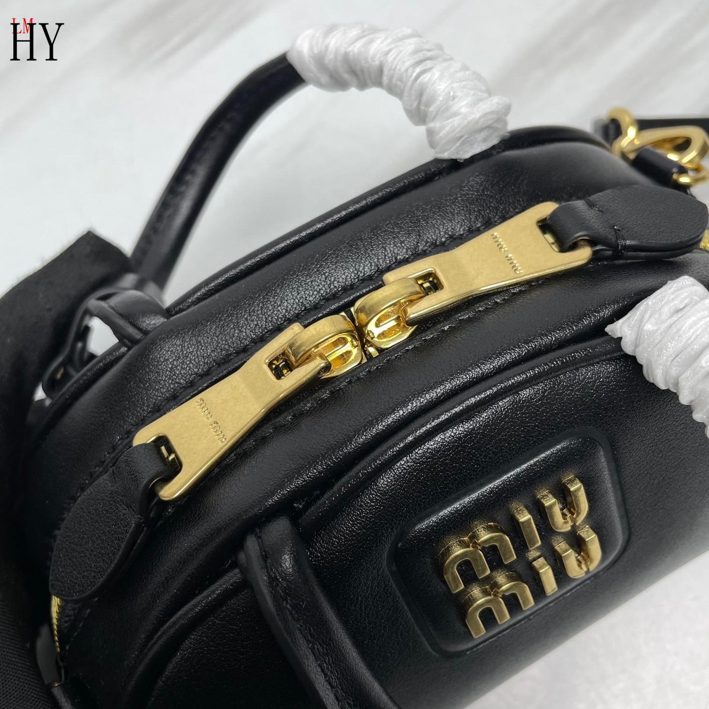 Miu Miu "Leather Mini Top Handle bag Black"
