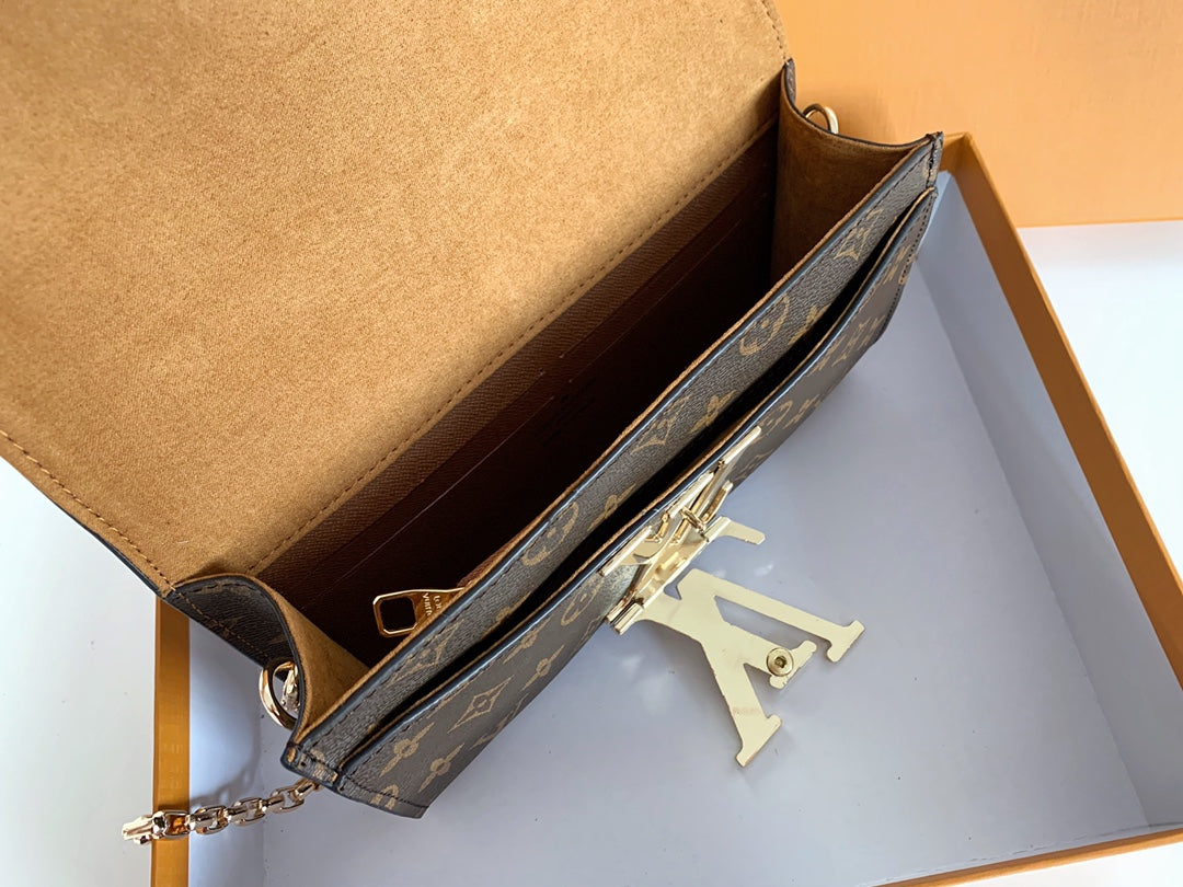 Louis Vuitton "Rouge Calfskin Leather Chain Louise MM Bag"