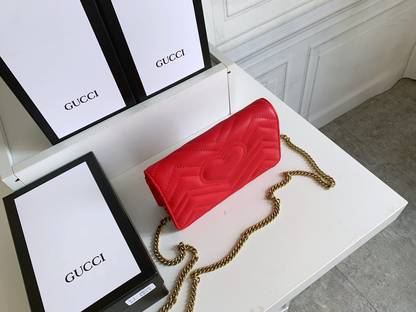 Gucci "Calfskin Matelasse GG Marmont Mini Bag Red"