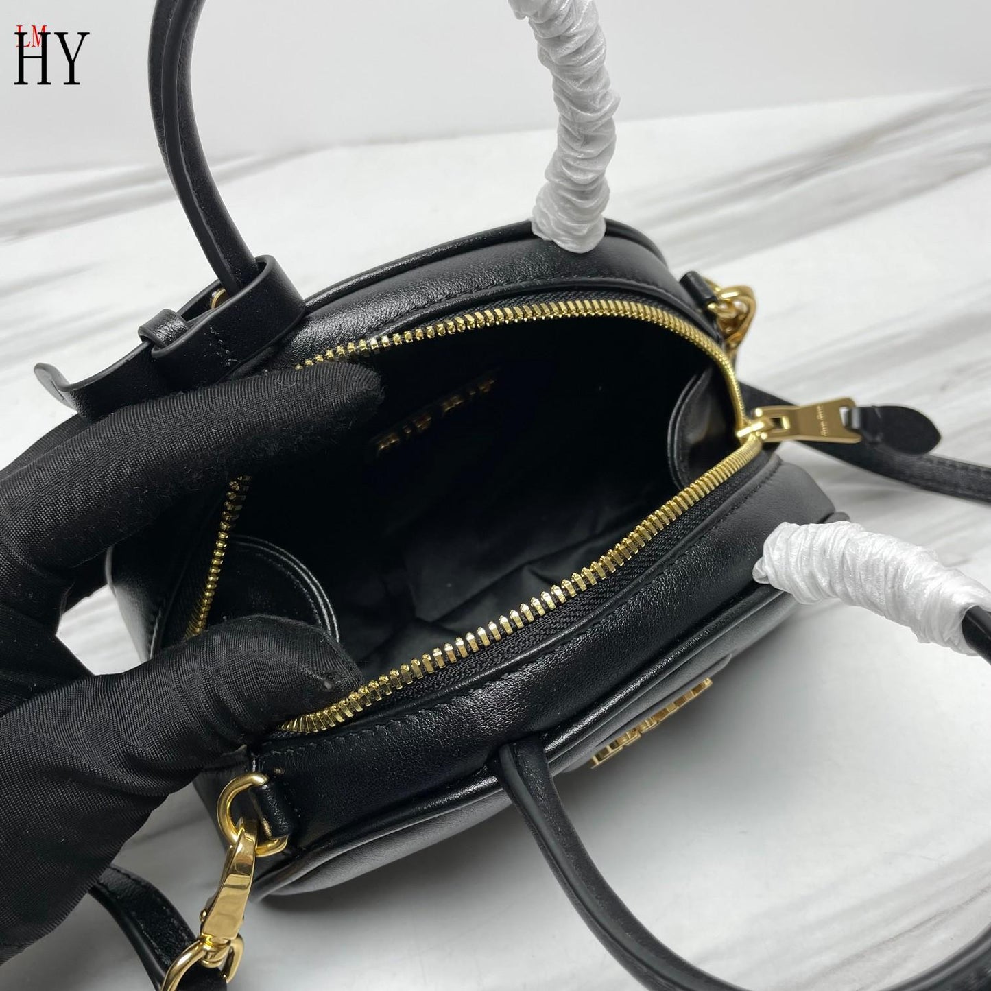 Miu Miu "Leather Mini Top Handle bag Black"