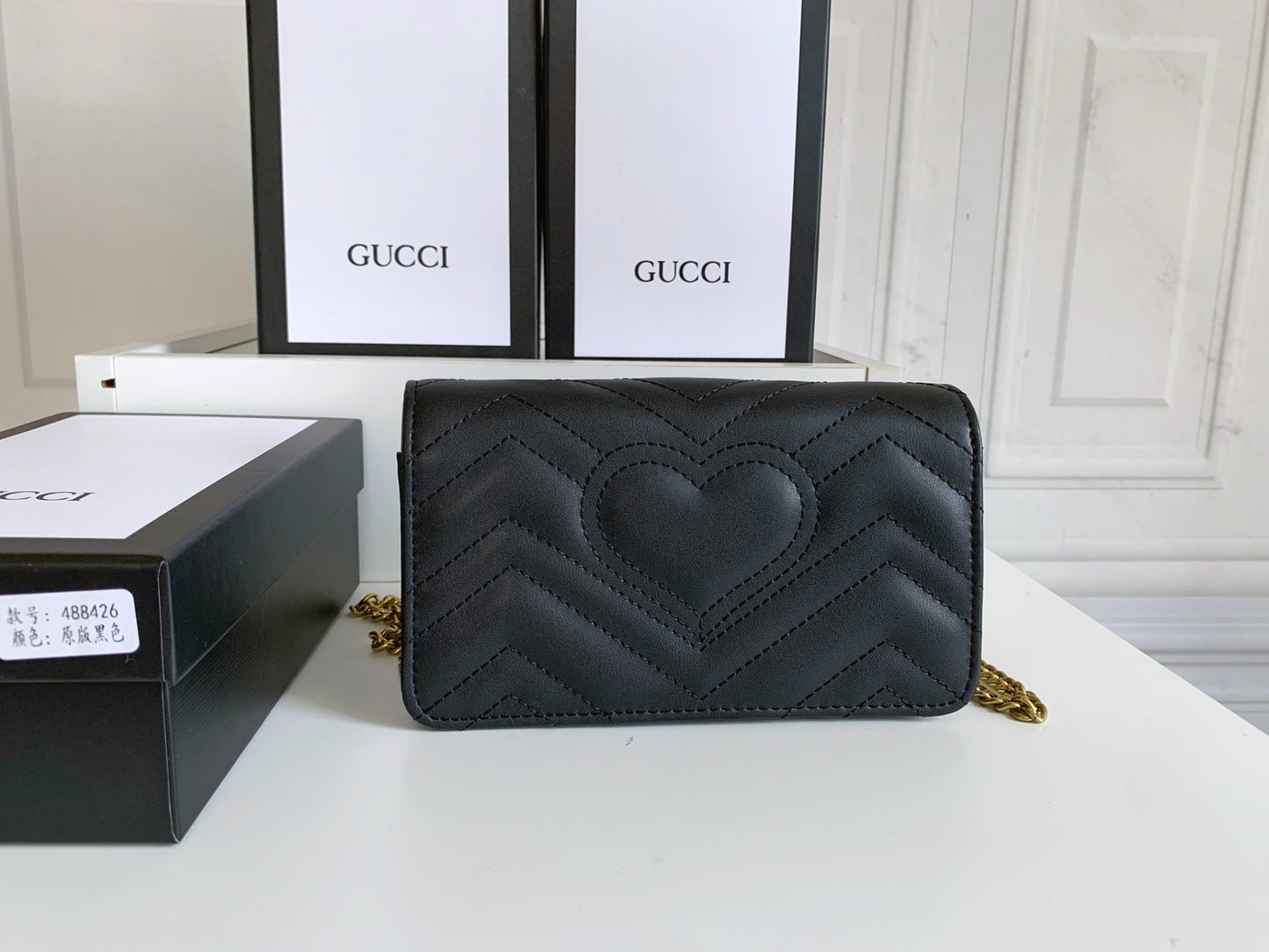 Gucci "Calfskin Matelasse GG Marmont Mini Bag Black"
