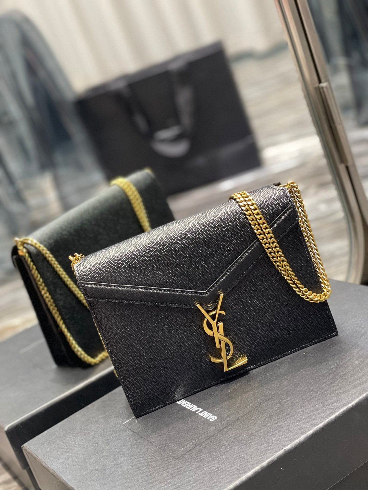 YSL "Cassandra Monogram Clasp Leather Crossbody"