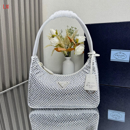 Prada "White Crystal Re-Edition Satin mini-bag with Crystals"