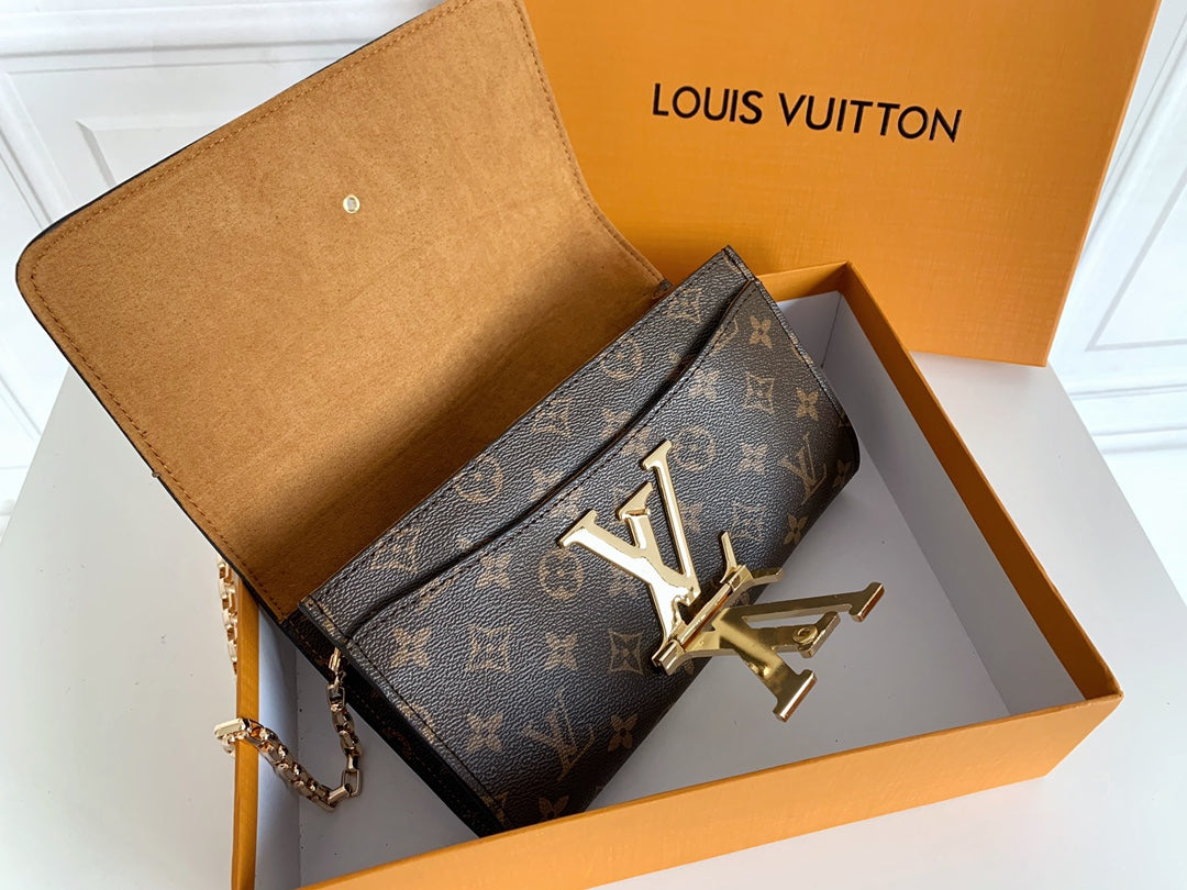Louis Vuitton "Rouge Calfskin Leather Chain Louise MM Bag"