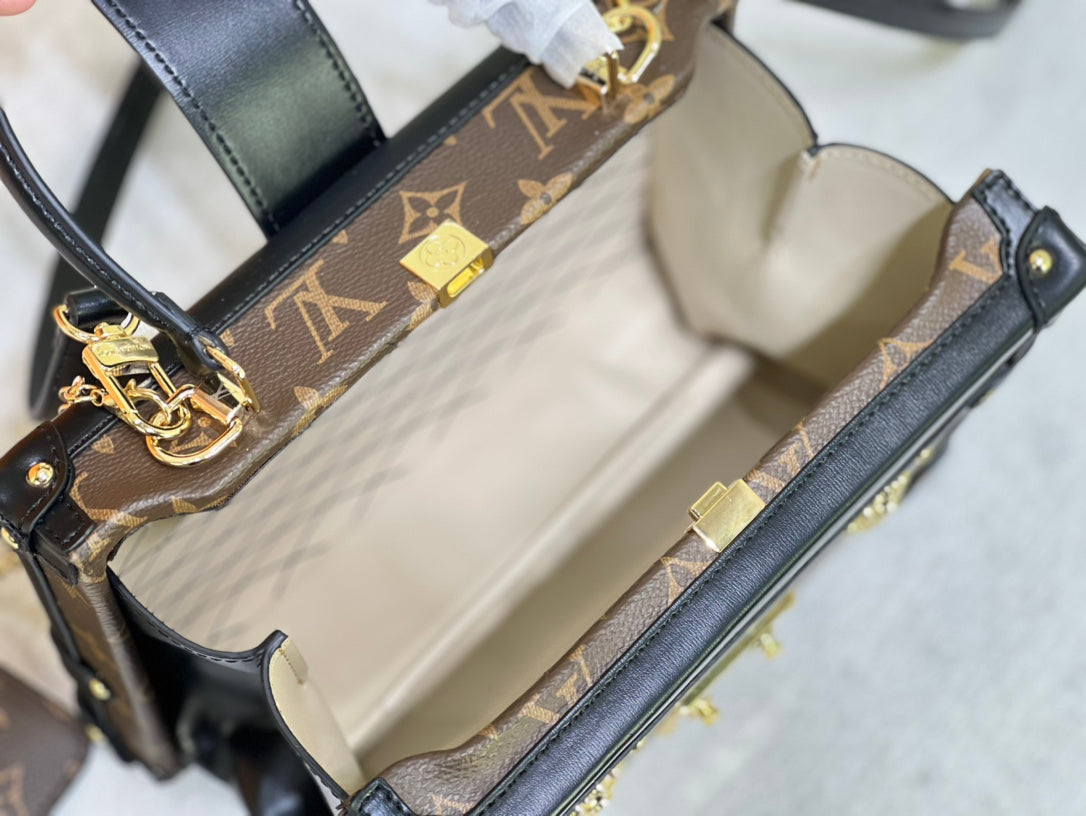 Louis Vuitton "Clutch Trunk Monogram Reverse Black in Coated Canvas"