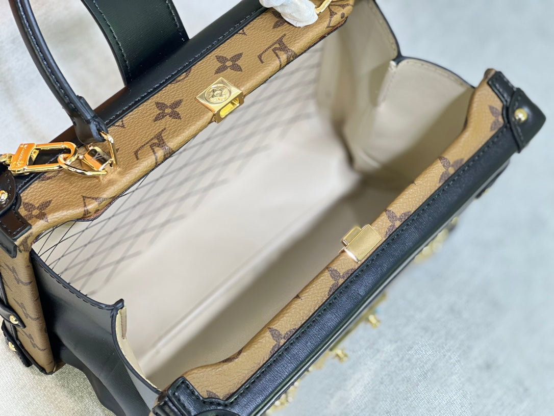 Louis Vuitton "Clutch Trunk Monogram Reverse Brown/Black in Coated Canvas"