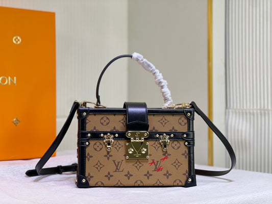 Louis Vuitton "Clutch Trunk Monogram Reverse Brown/Black in Coated Canvas"