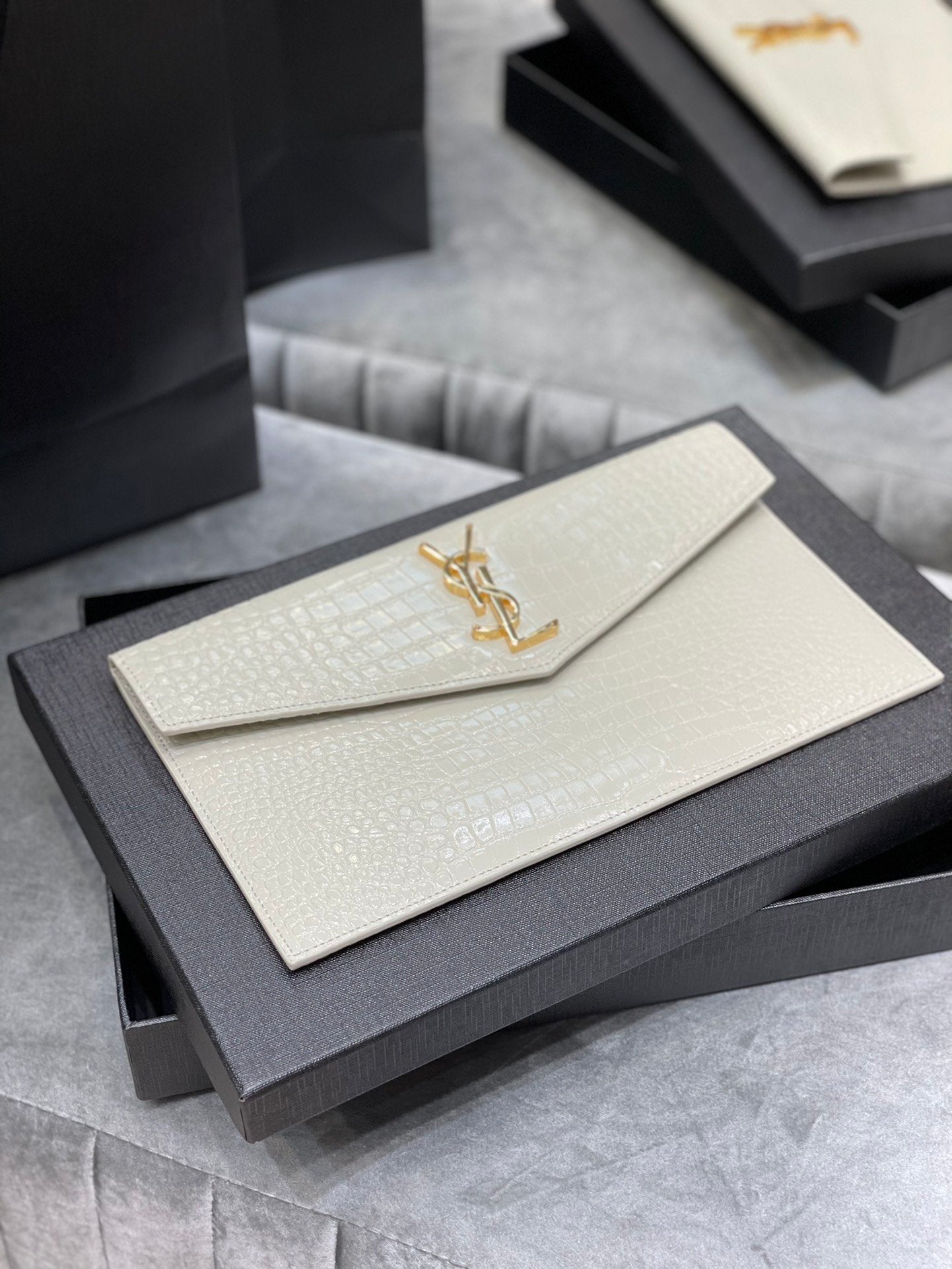 YSL "Medium Uptown Monogram Leather Clutch White and Gold"