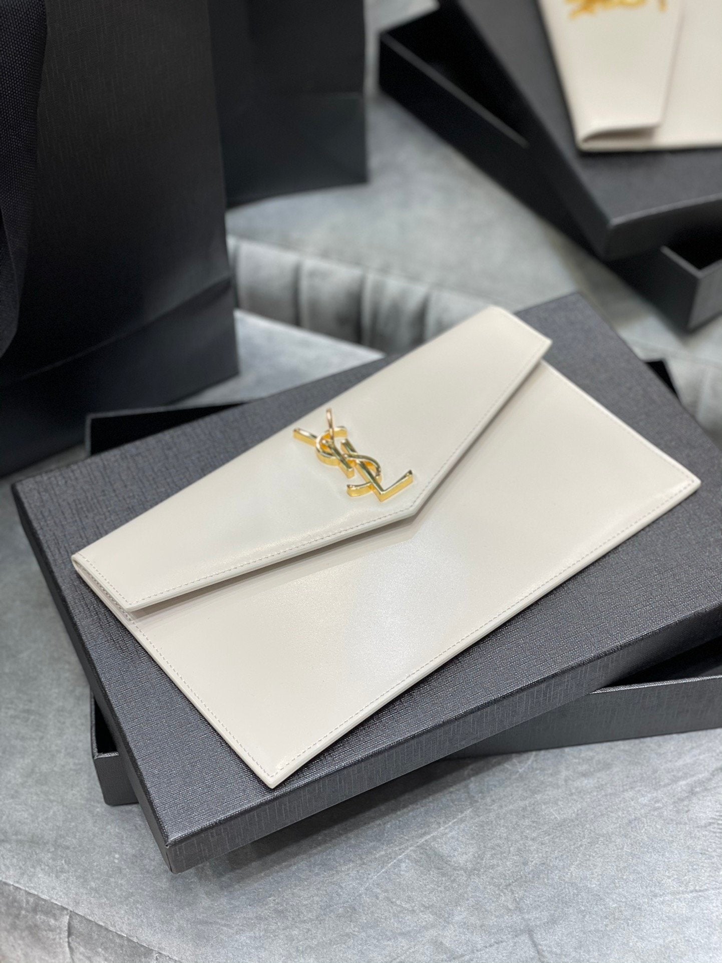 YSL "Medium Uptown Monogram Leather White and Gold"