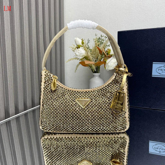 Prada "Gold Crystal Re-Edition Satin mini-bag with Crystals"